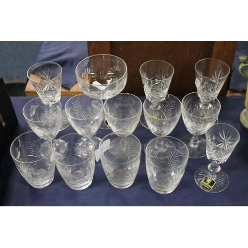 49 - Edinburgh Crystal glasses, some etched with fern or thistle decoration.