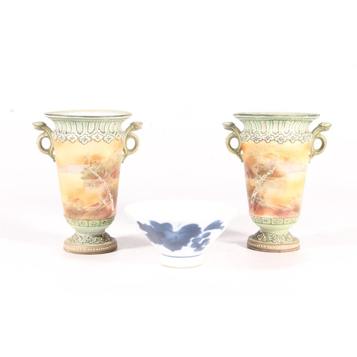 51 - Pair of Noritake painted vases and a Japanese blue and white saki bowl.