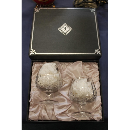 66 - Pair of Edinburgh Crystal brandy glasses in original box.