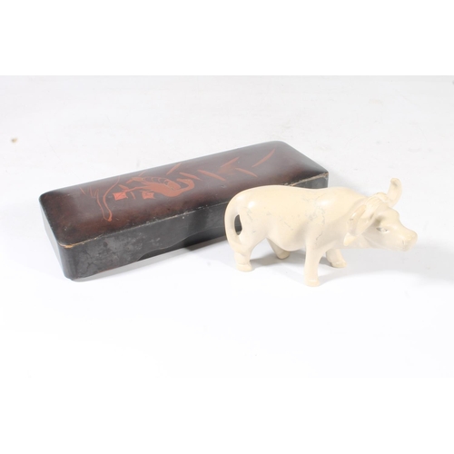 7 - Japanese lacquer pen box and a model of a water buffalo. 