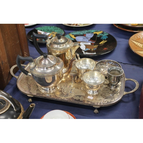 75 - Silver-plated ware to include a tray, a teaset and other items.