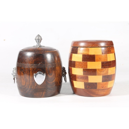 77 - Oak tobacco jar, and another treen tobacco jar.