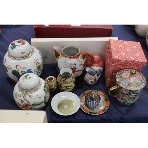 79 - 20th century oriental ceramics to include a chocolate cup and cover, a ginger jar, etc.