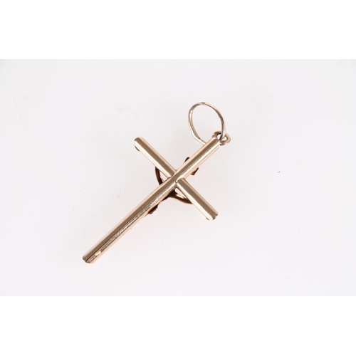 521 - Unmarked yellow metal crucifix pendant, 2.8g.