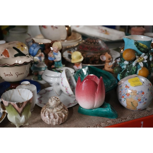 339 - Decorative ceramics to include Wade Whimsies, blue and white, vases, piggy bank, etc.