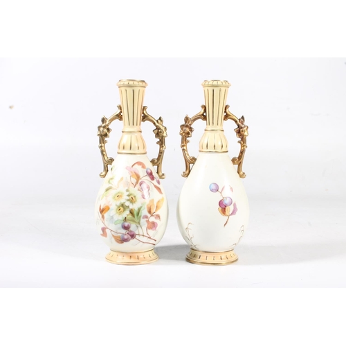 248 - Pair of continental blush ivory porcelain vases, 22cm high.