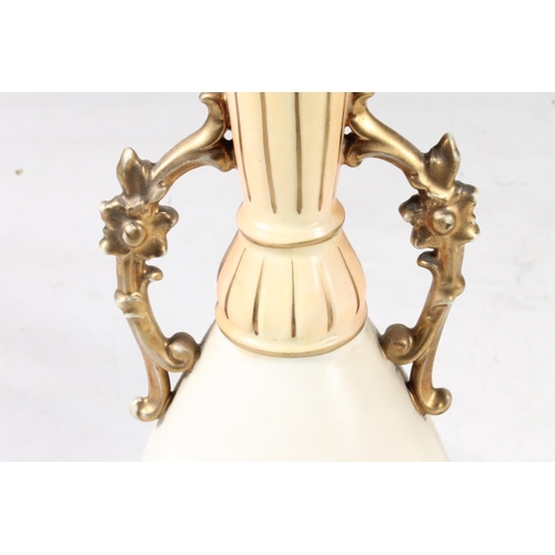 248 - Pair of continental blush ivory porcelain vases, 22cm high.