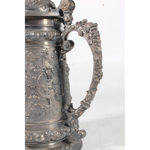 254 - German WMF pewter/silver plated tankard, 30cm high.