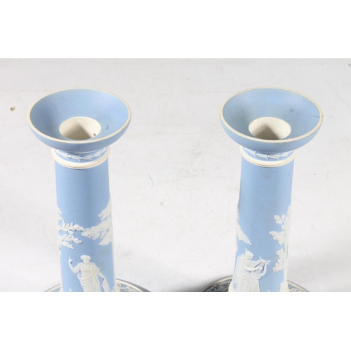 258 - Pair of early 20th century Wedgwood pale blue jasperware candlesticks, 20cm high.