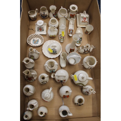 266 - Box containing crested china to include vases, shoes, teapots, etc.