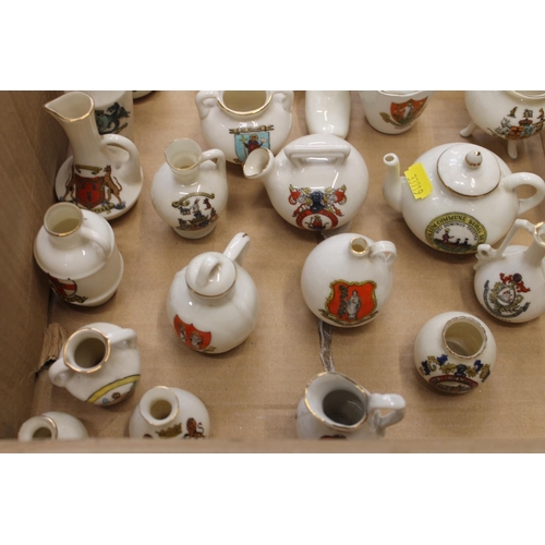 266 - Box containing crested china to include vases, shoes, teapots, etc.