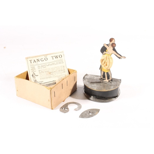 268 - Vintage Tango Two cardboard and tin novelty dancing couple for a gramophone.