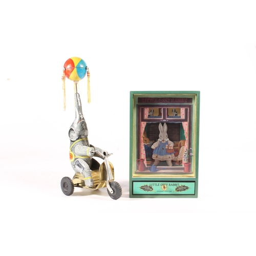 269 - Vintage Chinese circus elephant tinplate wind-up toy and a Japanese little grey rabbit clockwork mus... 