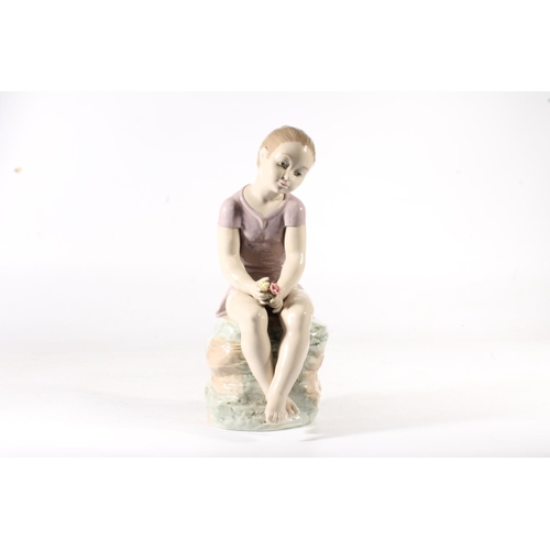 271 - Nao porcelain figurine of a young girl, 30cm high.