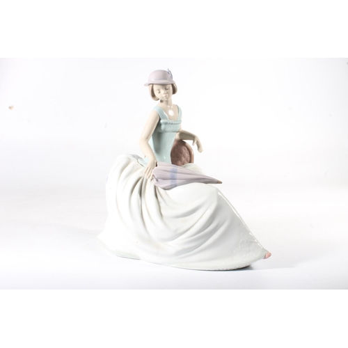 272 - Nao figurine of a girl with billowing skirt and parasol, 26cm high.