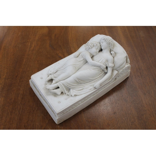 282 - 19th century Minton Parian ware figural group of two children on a mattress, 25cm long.