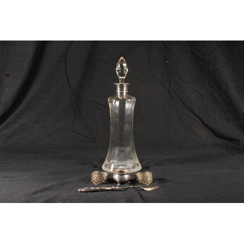 289 - Late 19th century glass decanter with silver collar, a silver-handled pickle fork, a silver-plated s... 