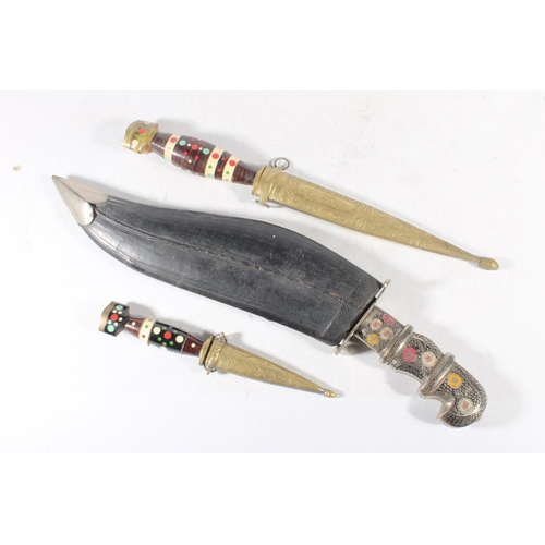 299 - Indian or Persian knife and two daggers.