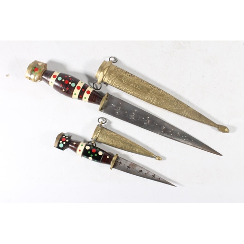 299 - Indian or Persian knife and two daggers.