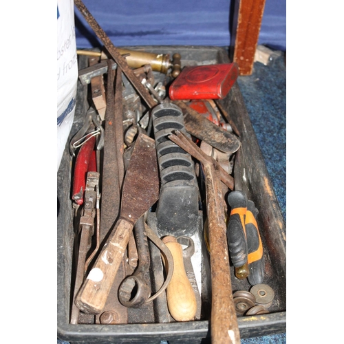 329 - Four Vauxhall hubcaps, a bag of chisels and other tools, etc.