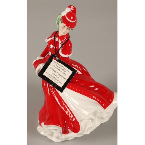 6 - Three Royal Doulton figurines to include Christmas Celebrations HN4721, Christmas Day HN3488, and Ch... 