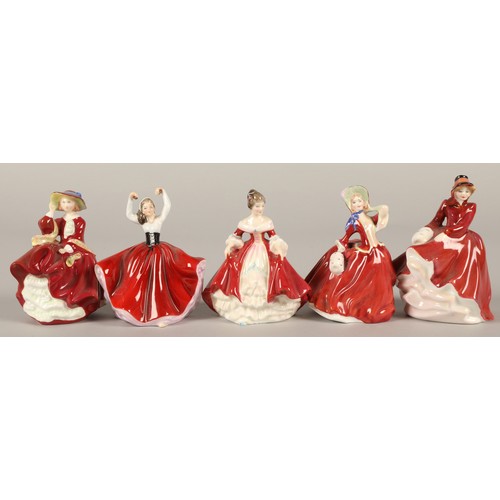 12 - Five small Royal Doulton figurines with display base, including Southern Belle HN3174, Top O' The Hi... 