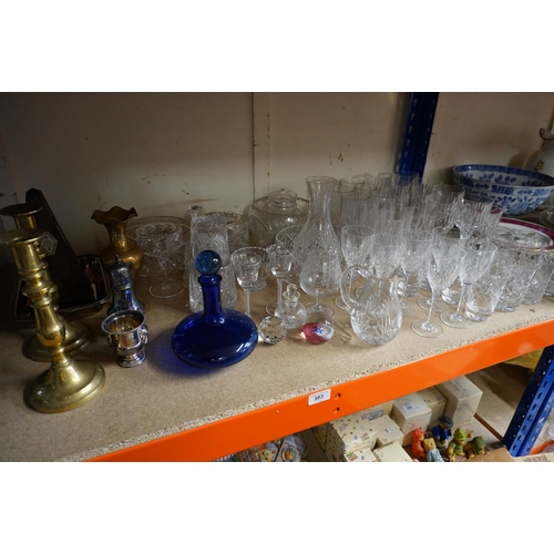 383 - Glassware to include wine glasses and tumblers, and brass candlesticks, a cased metronome, etc.