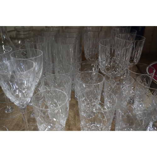 383 - Glassware to include wine glasses and tumblers, and brass candlesticks, a cased metronome, etc.