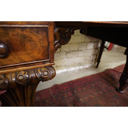 560 - Victorian walnut dressing table raised on heavily carved supports, 122cm wide.