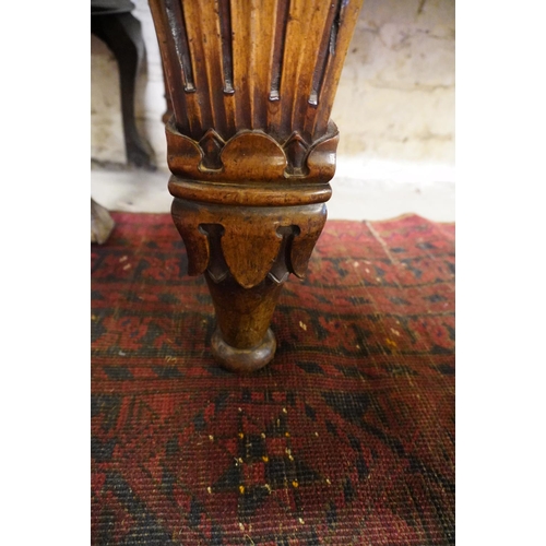 560 - Victorian walnut dressing table raised on heavily carved supports, 122cm wide.