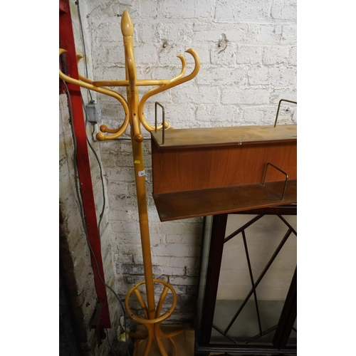 563 - Light oak bentwood hat and coat stand and a teak wall mountable bookshelf.