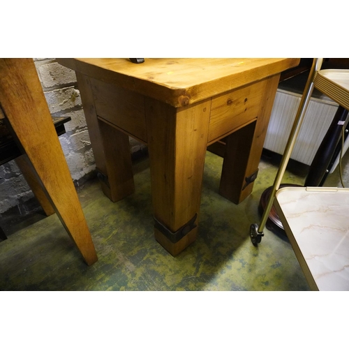 580 - Rustic pine occasional table, 63cm high.