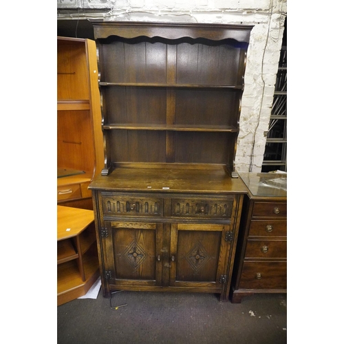 595 - Ercol style dark oak Welsh dresser, 91cm wide.