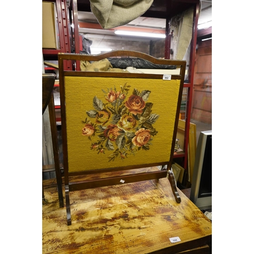 602 - Vintage mahogany fire screen with floral tapestry panel, 68cm.