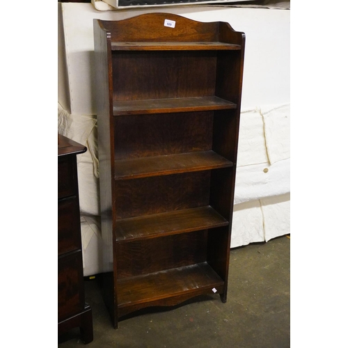 609 - Small oak free standing bookcase, 109cm high, 46cm wide.