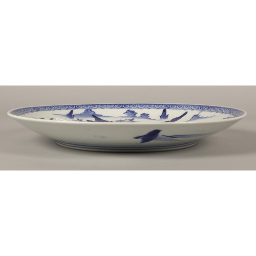 21 - Large Arita style blue and white Japanese charger, impressed mark under glaze to base