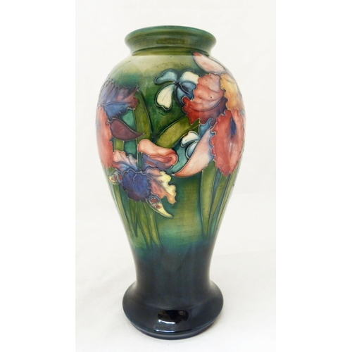 307 - William Moorcroft 'Anemone' pattern tube-lined vase in two-tone green and blue ground, marked to the... 