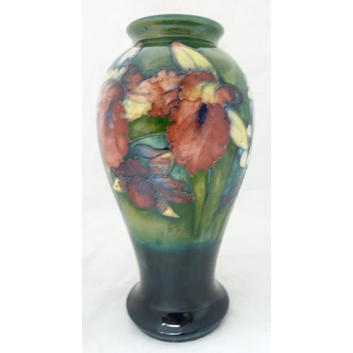 307 - William Moorcroft 'Anemone' pattern tube-lined vase in two-tone green and blue ground, marked to the... 