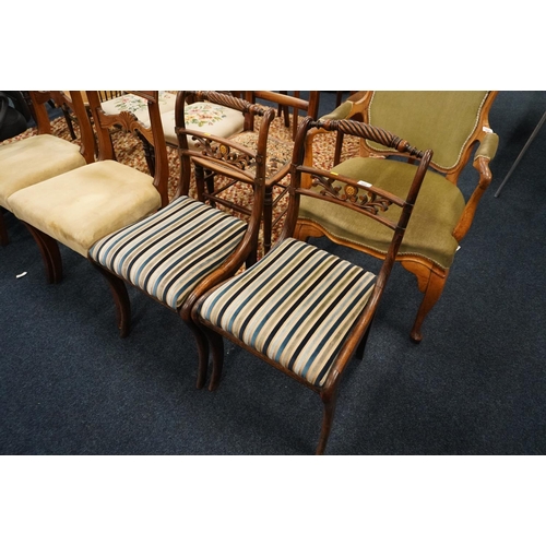 660 - Pair of Victorian walnut hall chairs.