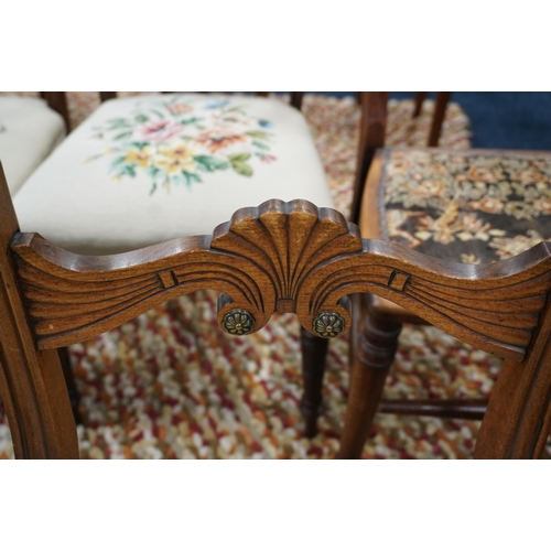 661 - Pair of Edwardian chairs with scroll and shell form back splat.