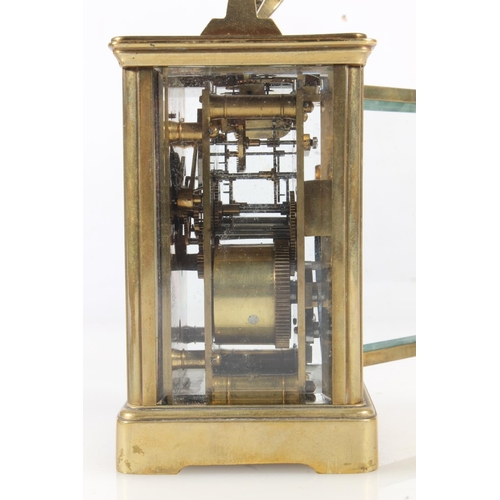 303 - Early 20thC brass carriage clock in burgundy case.