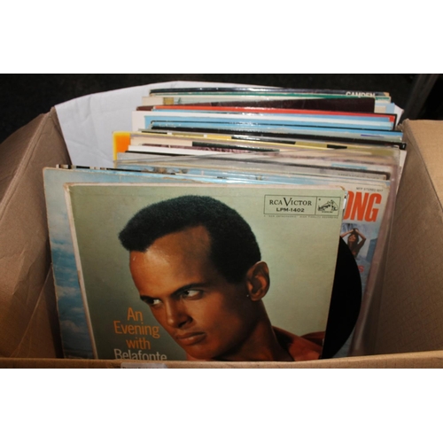 398 - Box containing records to include Mike Oldfield, Harry Belafonte, etc.