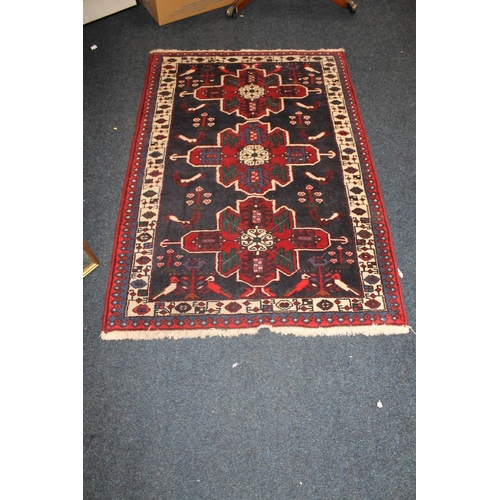 616 - Persian saveh rug, 160cm x 105cm.