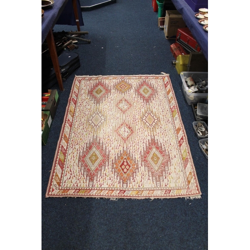 617 - Cream ground kilim rug, central field decorated with three rows of three of various sizes and design... 