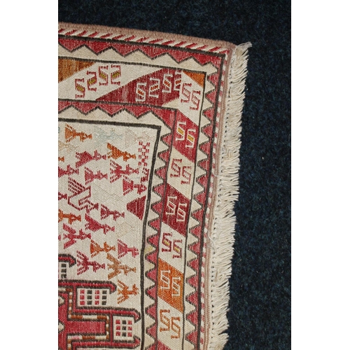 617 - Cream ground kilim rug, central field decorated with three rows of three of various sizes and design... 