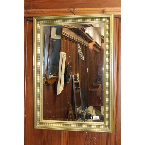 639 - Modern gilt framed wall mirror.