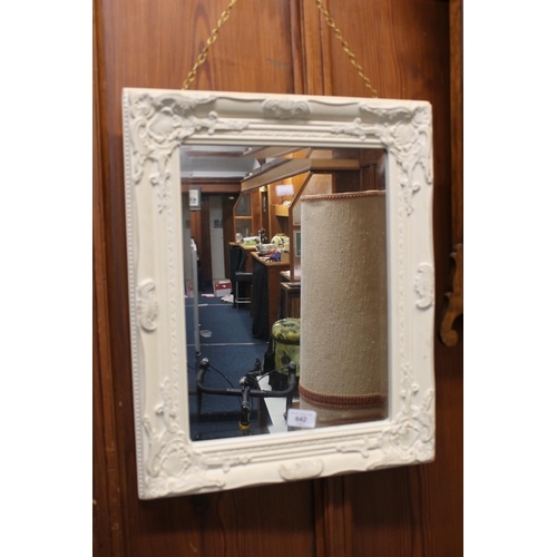 642 - Rectangular wall mirror in cream painted frame.