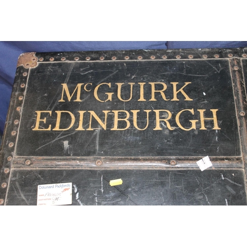 652 - Large early 20thC ebonized wood and metal bound luggage trunk, labelled McGuirk Edinburgh, H66cm.