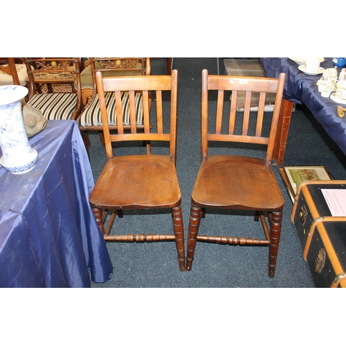 659 - Pair of oak farmhouse style kitchen chairs.