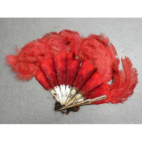 308 - Red Ostrich feather folding fan with simulated tortoiseshell sticks, and another of white feathers (... 